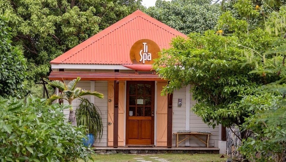 Entrance of TI SPA surrounded by lush greenery in Grand Case, Collectivité De Saint-Martin, MF.