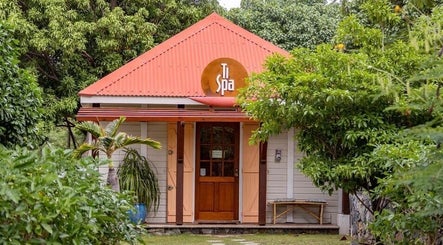 Entrance of TI SPA surrounded by lush greenery in Grand Case, Collectivité De Saint-Martin, MF.