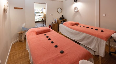 Peaceful massage room at TI SPA, Grand Case, Collectivité De Saint-martin, MF, featuring two massage tables.