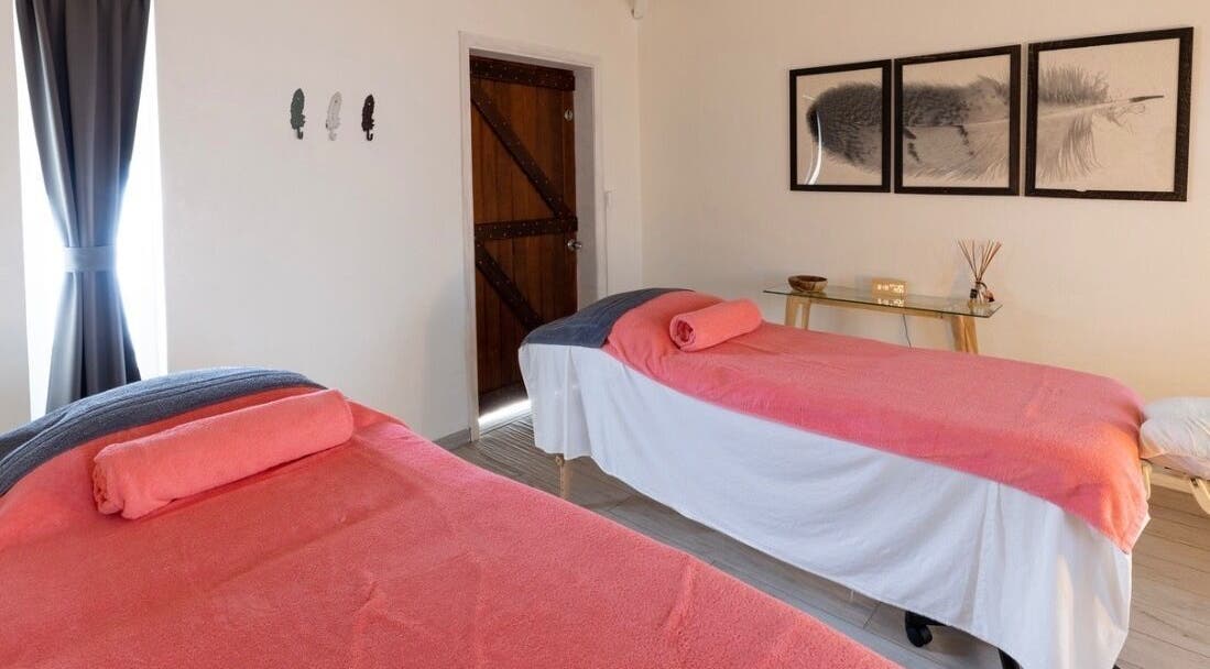 Relaxing massage room at TI Spa, Grand case, Collectivité De Saint-martin, MF with two cozy treatment beds.