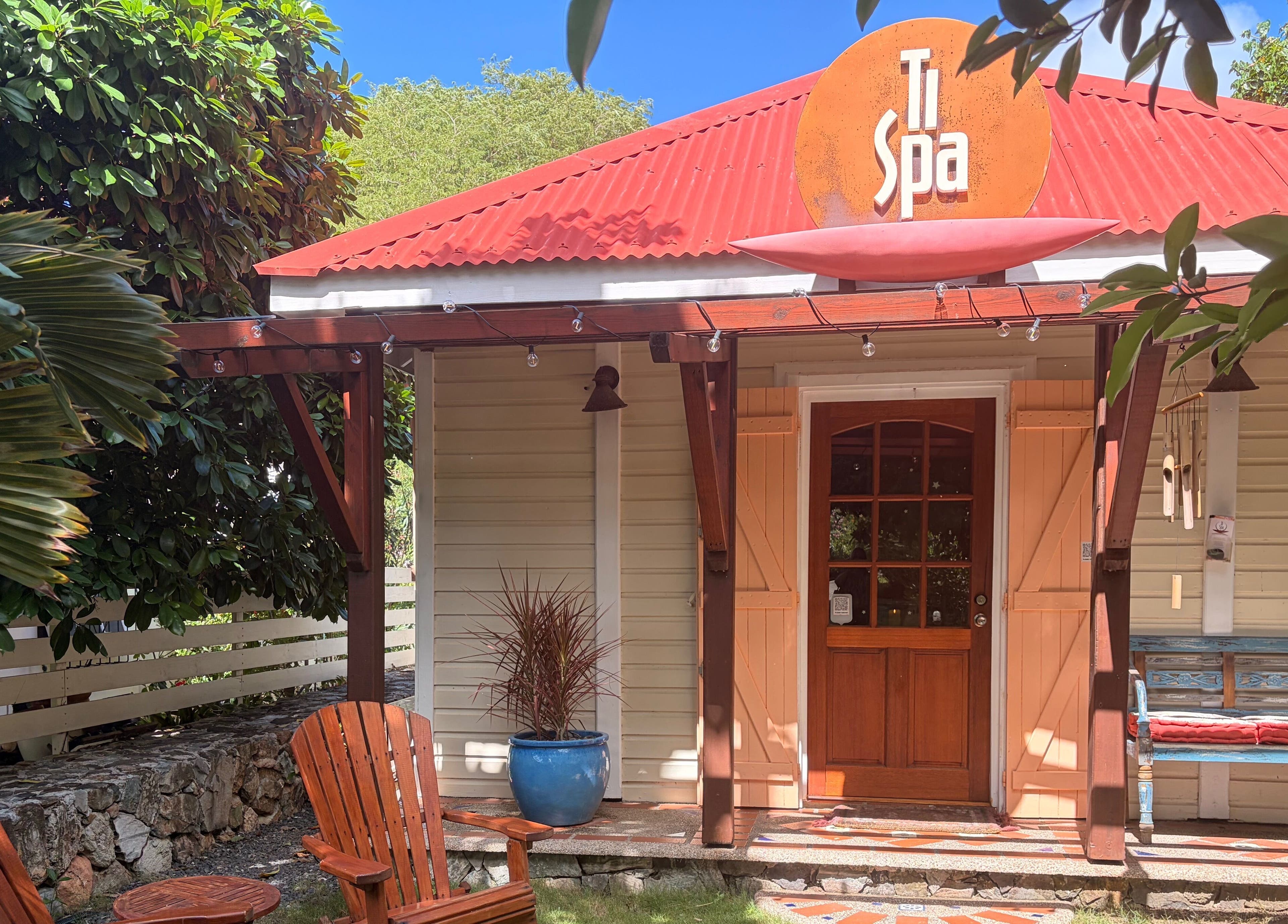 Entrance of TI Spa with inviting patio seating in Grand Case, Collectivité De Saint-martin, MF.