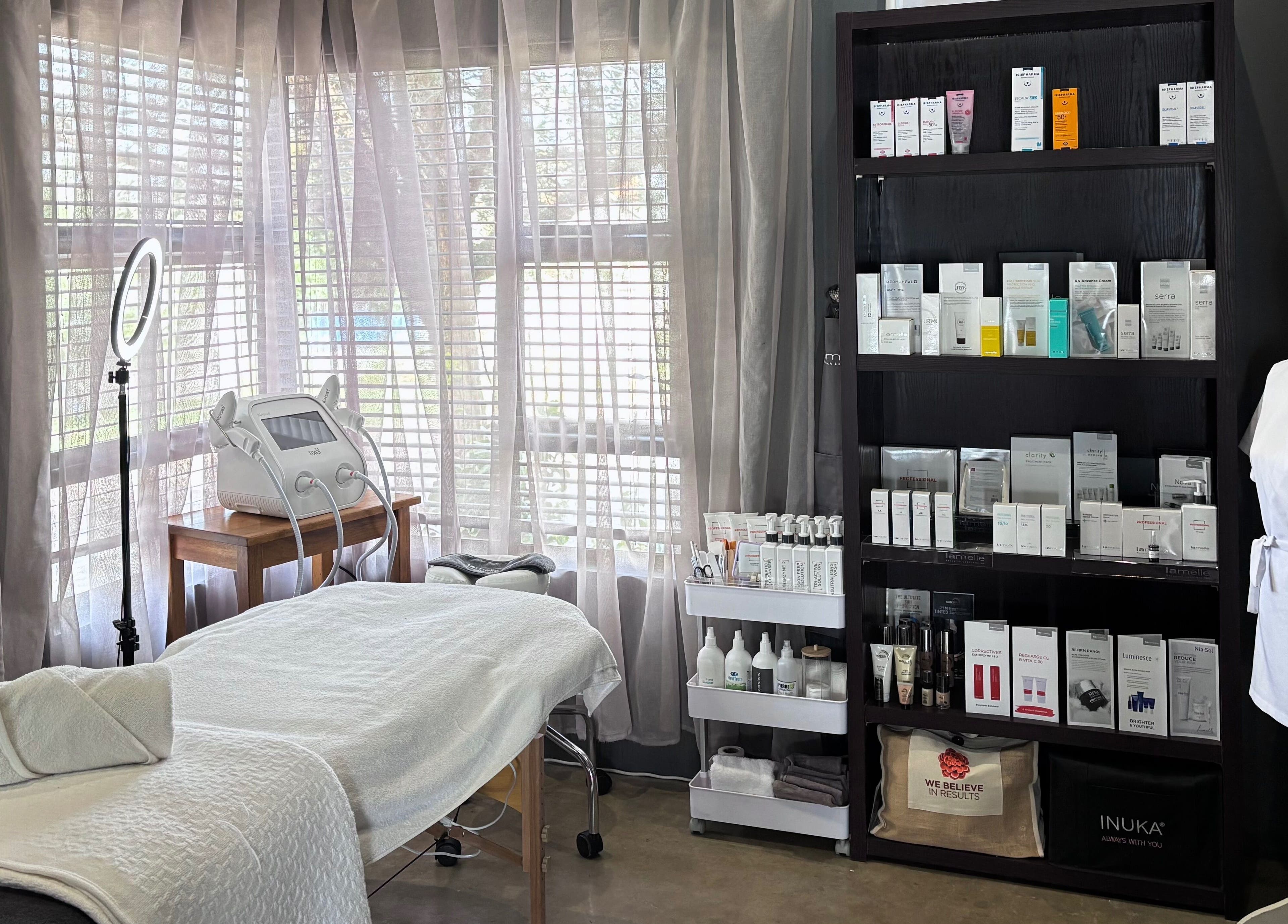 Tranquil treatment room at Primavera Aesthetics, Olifantsfontein, Gauteng, ZA with professional skincare products.