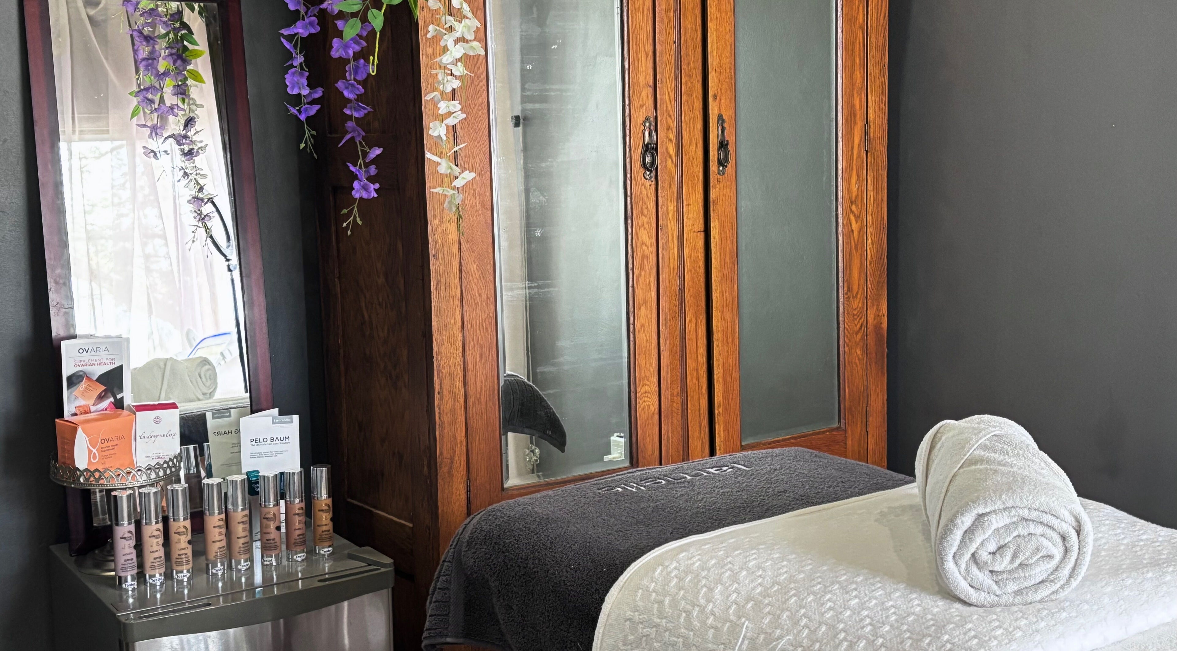 Cozy treatment room at Primavera Aesthetics in Olifantsfontein, Gauteng, ZA with elegant wooden decor.