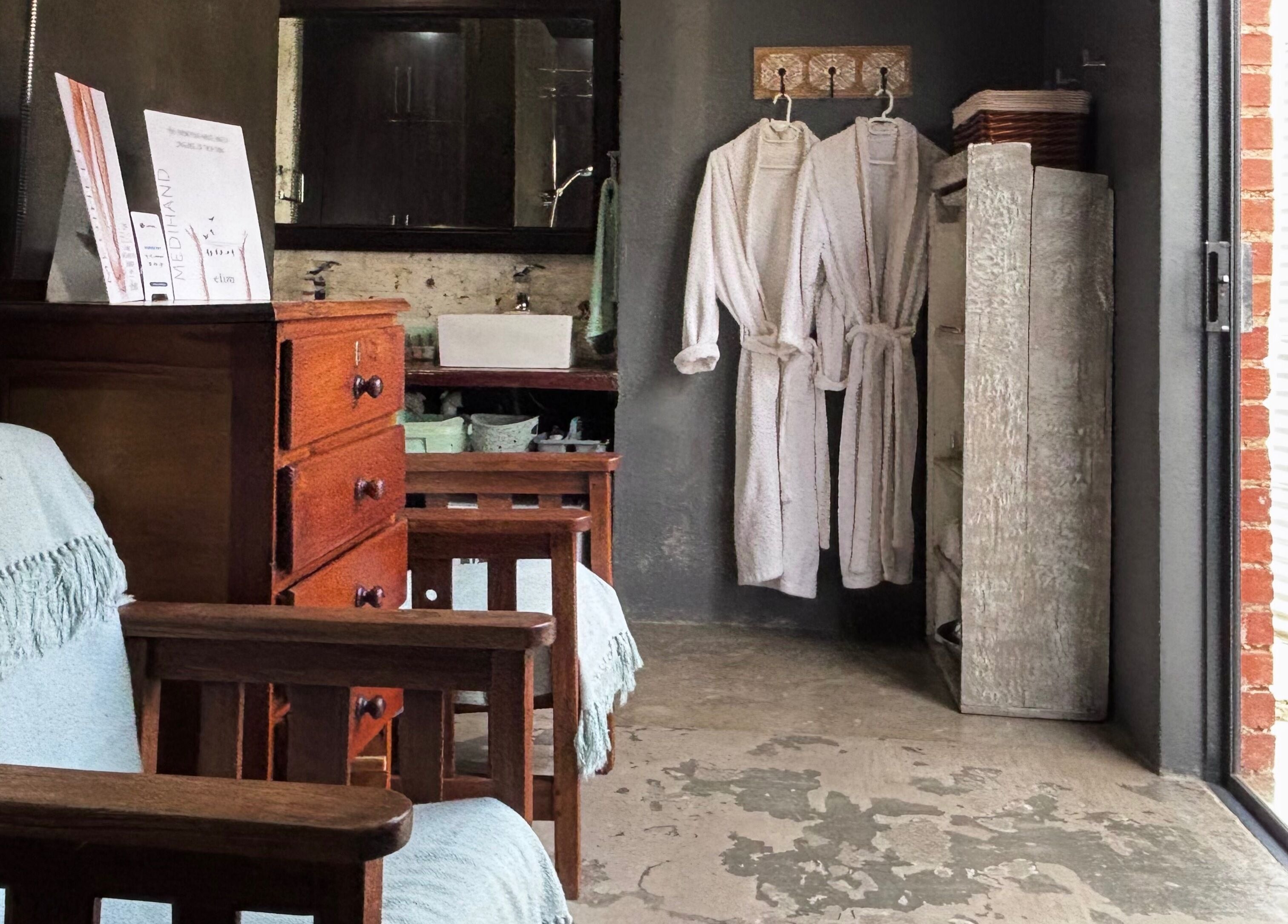 Relaxing spa room with robes at Primavera Aesthetics in Olifantsfontein, Gauteng, ZA.