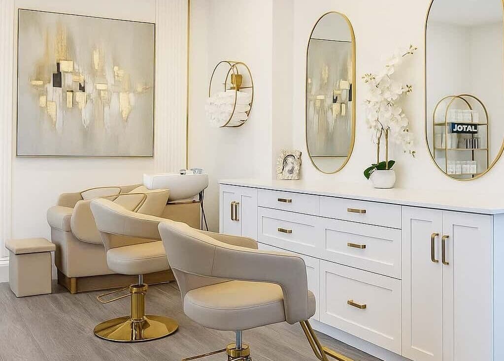 Luxurious salon interior at Atah’s Elegance, Hamilton, Ontario, CA, featuring stylish chairs and elegant decor.