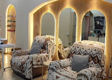 Relaxing lounge chairs and nail stations at MD Beauty Lash, Jawa Barat, Jawa Barat, ID. Serene and inviting space.