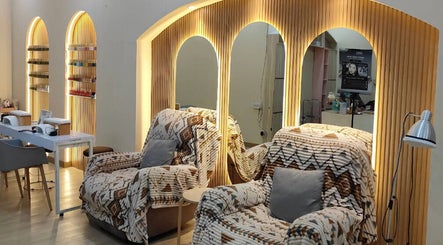 Relaxing lounge chairs and nail stations at MD Beauty Lash, Jawa Barat, Jawa Barat, ID. Serene and inviting space.