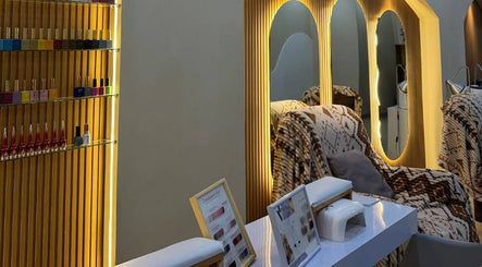 MD Beauty Lash elegant nail salon interior in Jawa Barat, ID with mirrors and cozy chairs.