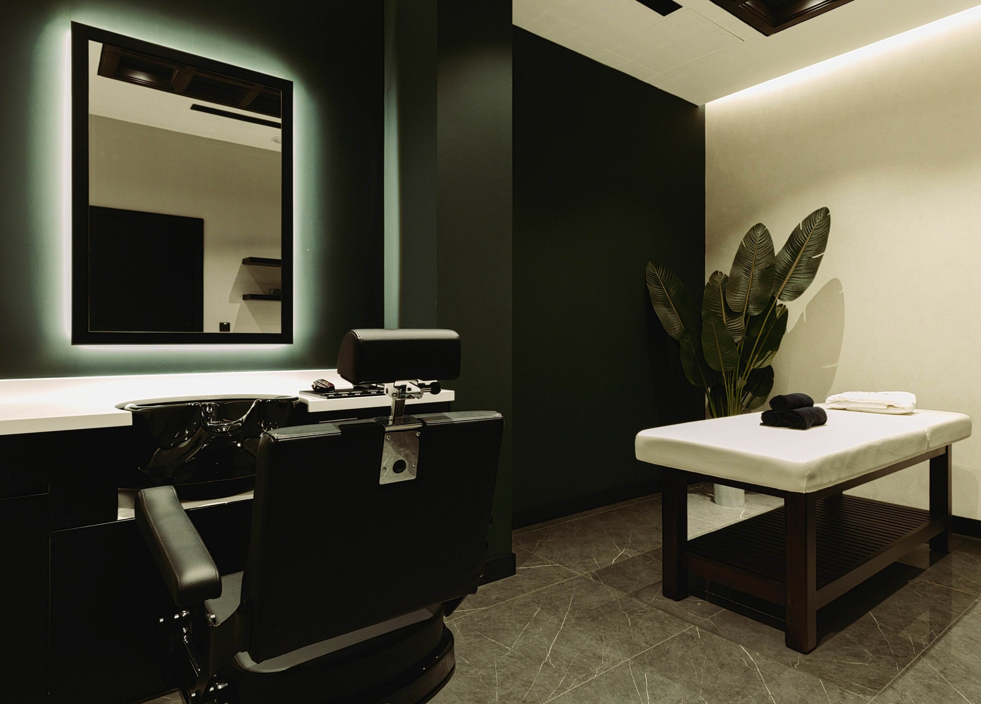 Modern barber chair and relaxing space at Barber Republic Gents Saloon, Dubai, AE.