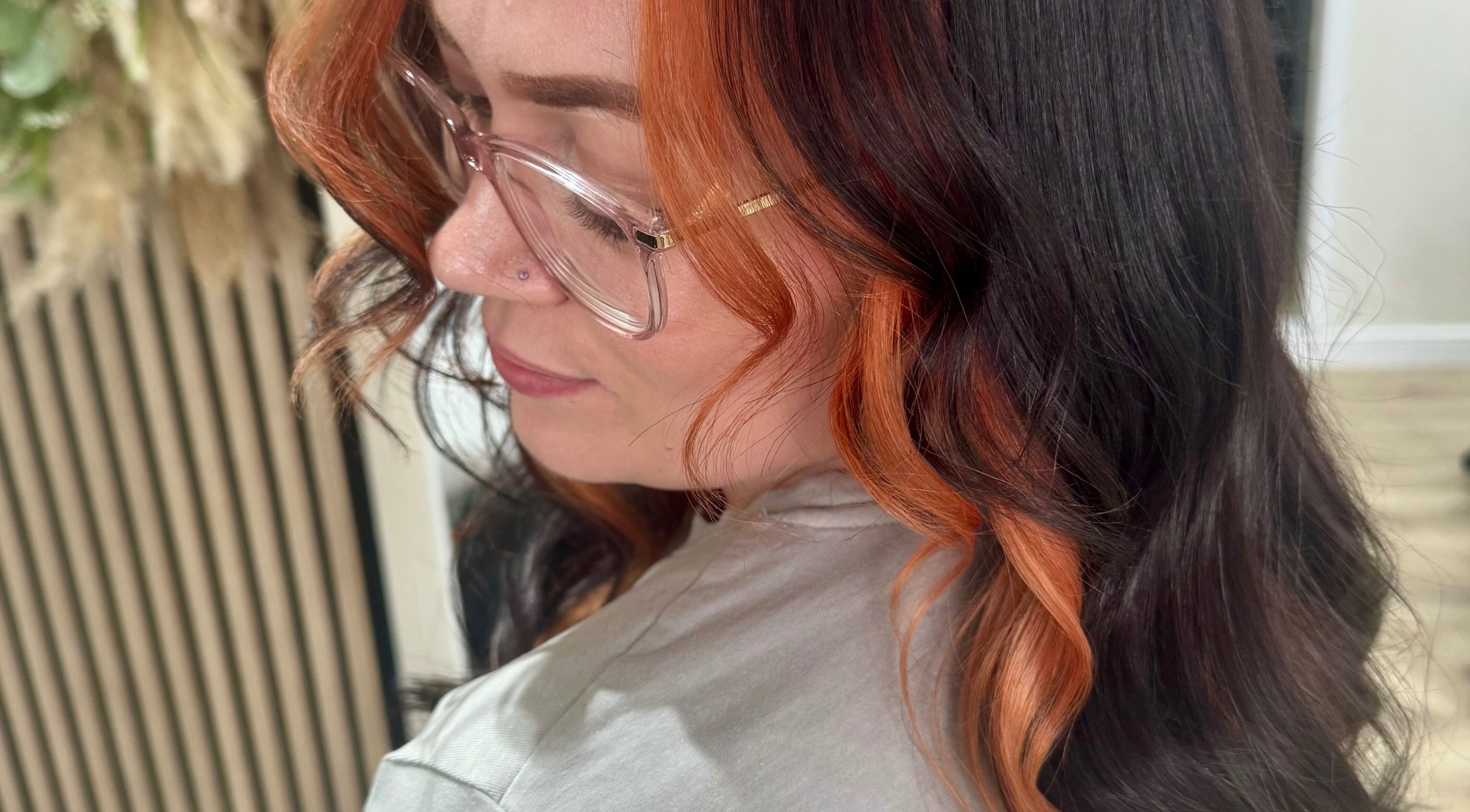 Stylish auburn and black hair styling at Ben Westbrook Hair in Derby, England, GB.