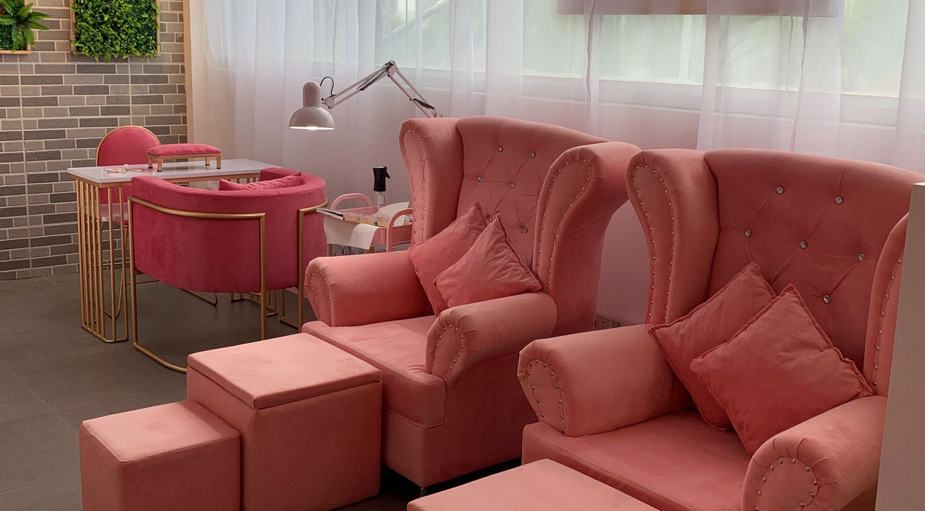 Elegant pink seating at Kath Nail Lounge in Guagua, Central Luzon, PH offering relaxation and style.