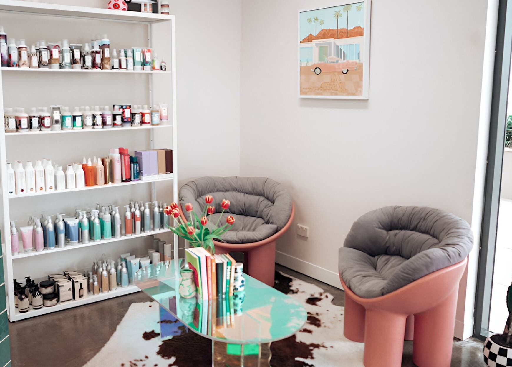 Stylish salon lounge at Hunny Mane Hair Artistry, Maroochydore, Queensland, AU with modern decor and hair products.