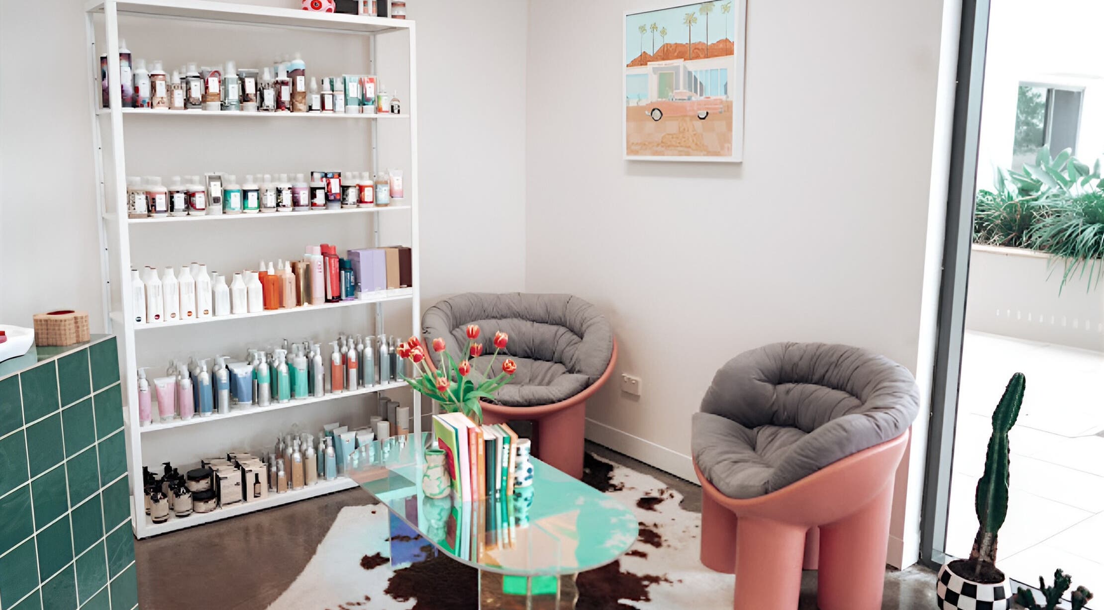 Stylish salon lounge at Hunny Mane Hair Artistry, Maroochydore, Queensland, AU with modern decor and hair products.