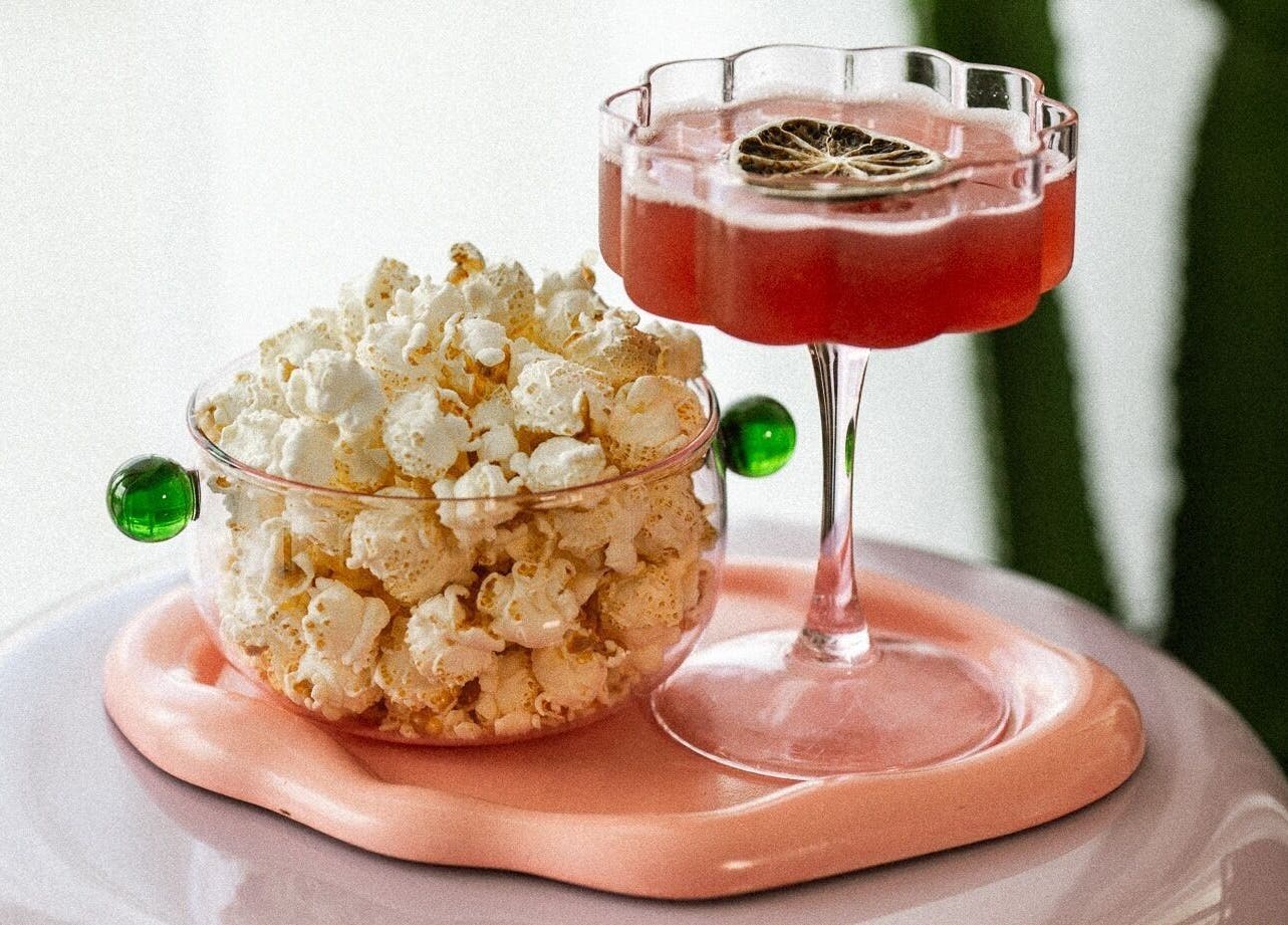 Elegant popcorn bowl and cocktail at Hunny Mane Hair Artistry in Maroochydore, Queensland, AU.