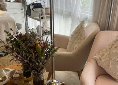 Cozy beauty treatment room at Skin & Brow Collective, Peregian Springs, Queensland, AU with soft lighting and decor.