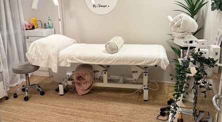 Tranquil treatment room at Skin & Brow Collective, Peregian Springs, Queensland, AU featuring a luxurious massage table.