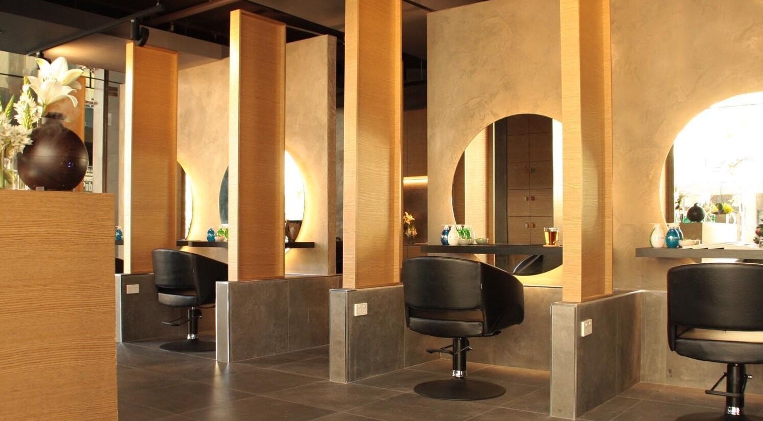 Stylish interior of Hair Collection Tokyo Perth CBD, Perth, Western Australia, AU with modern salon stations.