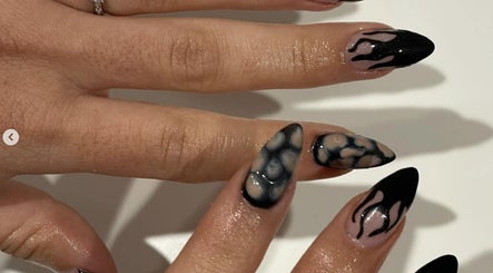 Elegant black and marble nails design at Gelled by NR, Melbourne, Victoria, AU, showcasing modern nail art.