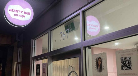 Front of Gelled by NR, a beauty venue in Melbourne, Victoria, AU, featuring lit signage and glass doors.