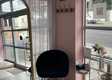 Stylish salon interior at Gelled by NR, Melbourne, Victoria, AU featuring sleek decor and beauty products.