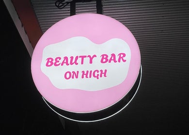 Round pink Beauty Bar On High sign at Gelled by NR, Melbourne, Victoria, AU.