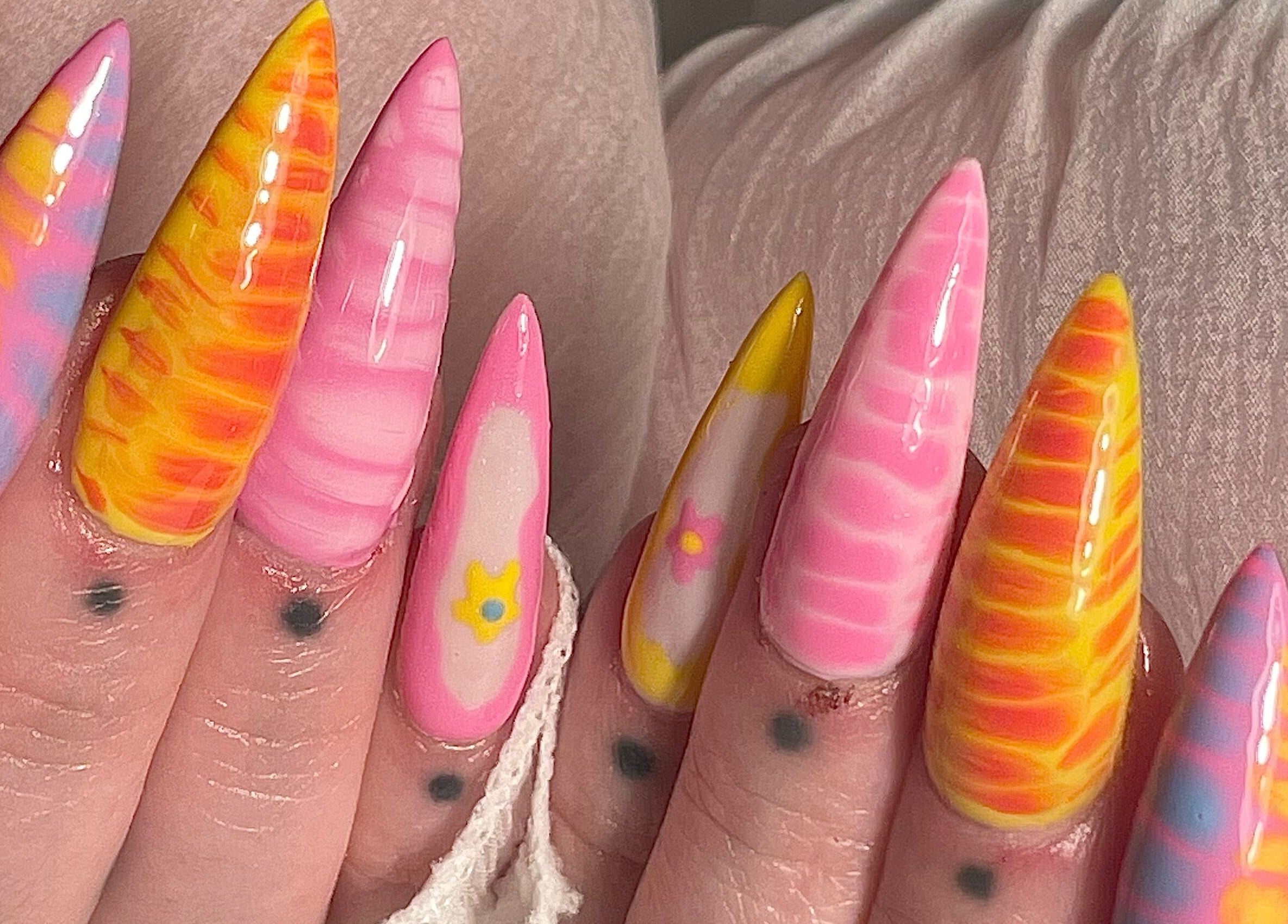 Vibrant, multicolored nail art design from Gelled by NR in Melbourne, Victoria, AU.