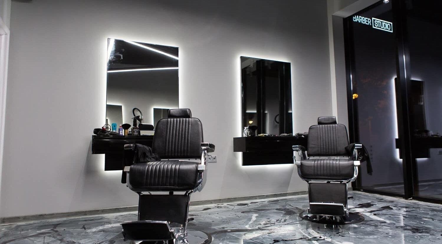 Modern barber chairs at Barber Studio 2, Plovdiv, Plovdiv, BG, showcasing sleek-style interior.