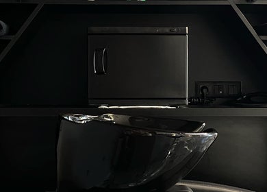 Elegant black styling station at Barber Studio 2 in Plovdiv, Plovdiv, BG, with modern fixtures.