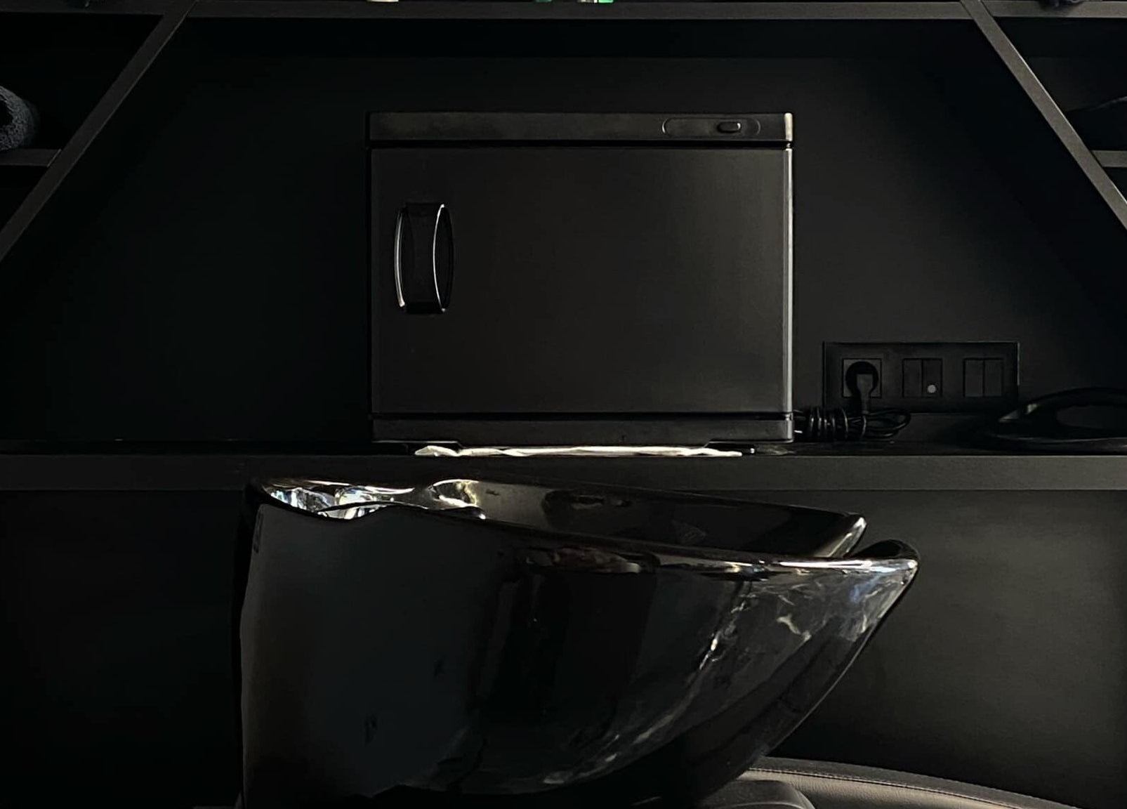 Elegant black styling station at Barber Studio 2 in Plovdiv, Plovdiv, BG, with modern fixtures.