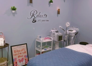Relaxing massage room at BeYoung Massage, Tysons, Virginia, US, with spa equipment and decor.