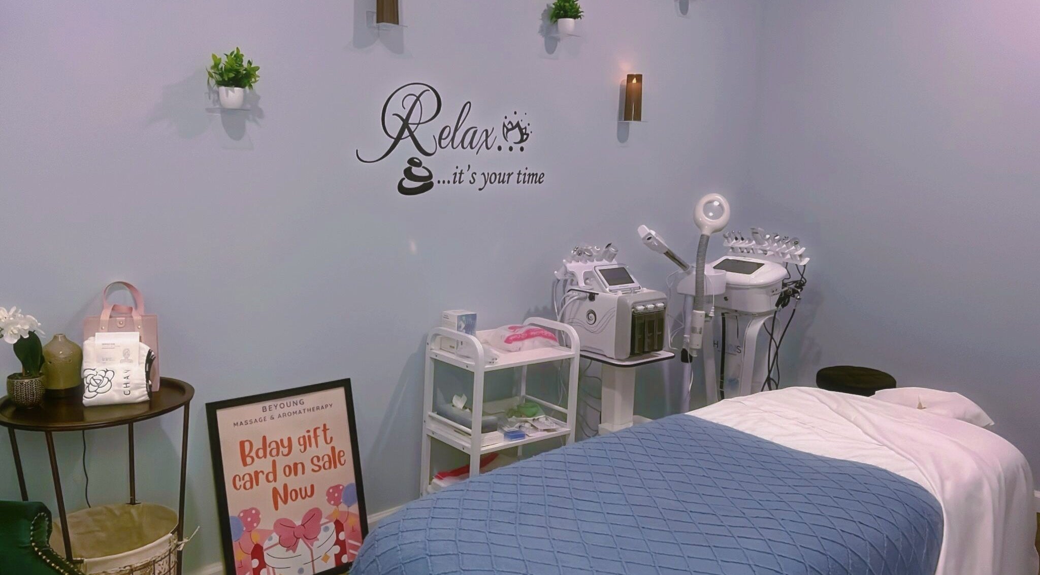 Relaxing massage room at BeYoung Massage, Tysons, Virginia, US, with spa equipment and decor.