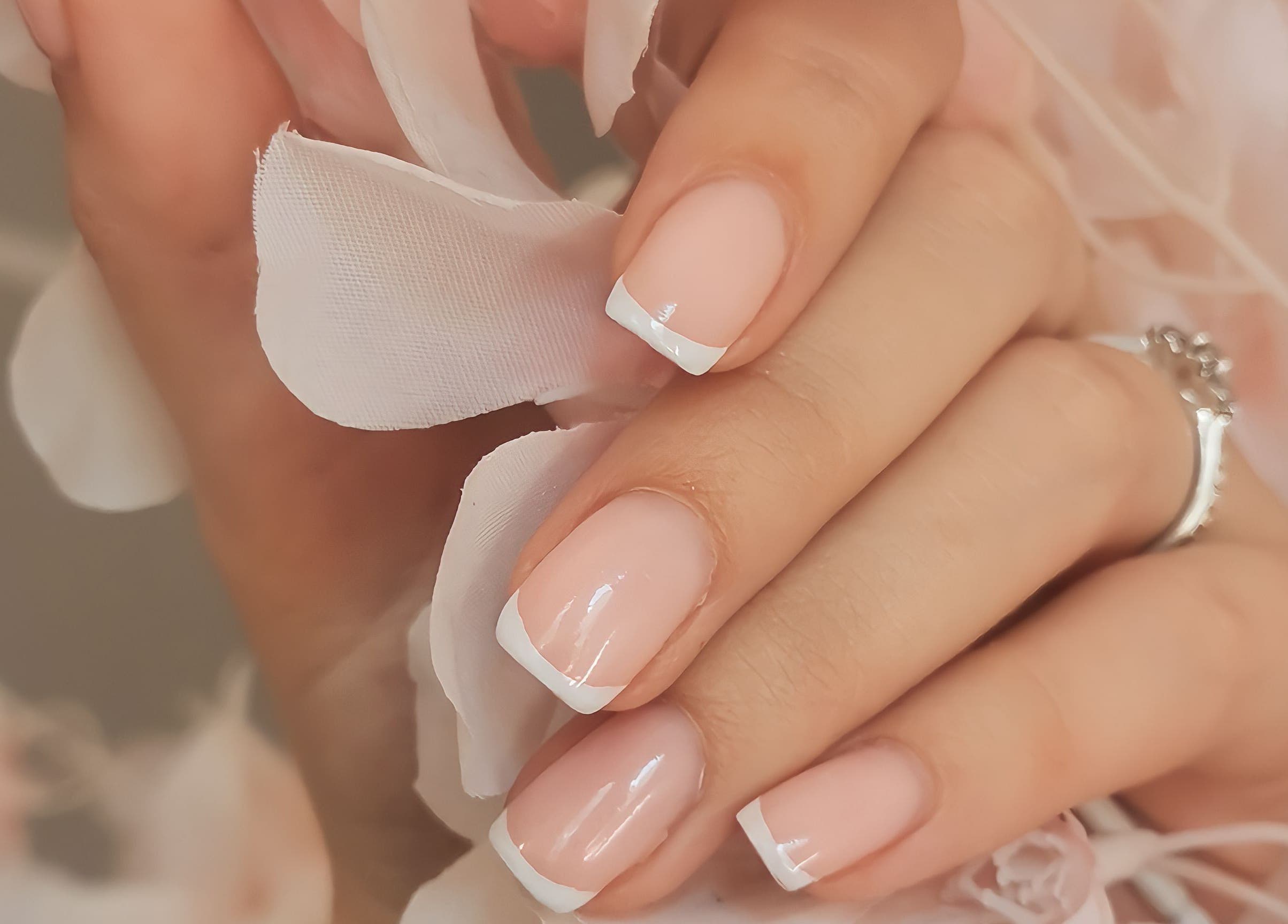 Chic French manicure at NovaBelle Beauty, Cape Town, Western Cape, ZA offering luxury nail services.