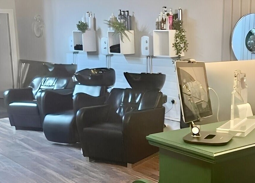 Luxurious salon chairs and stylish decor at Cherry Bomb, Frodsham, England, GB.