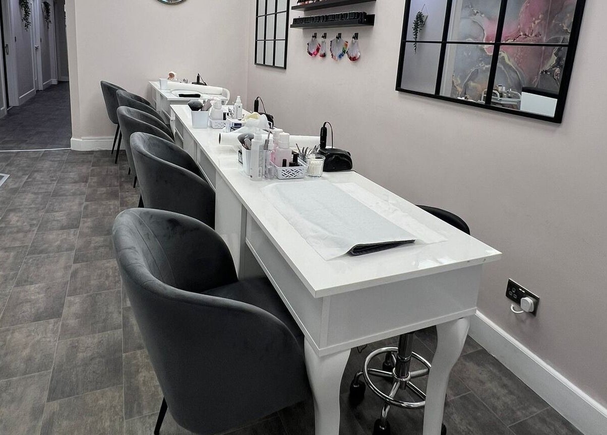 Modern nail service area at Salon 15 Beauty Rooms in Dublin, County Dublin, IE, with sleek decor and seating.