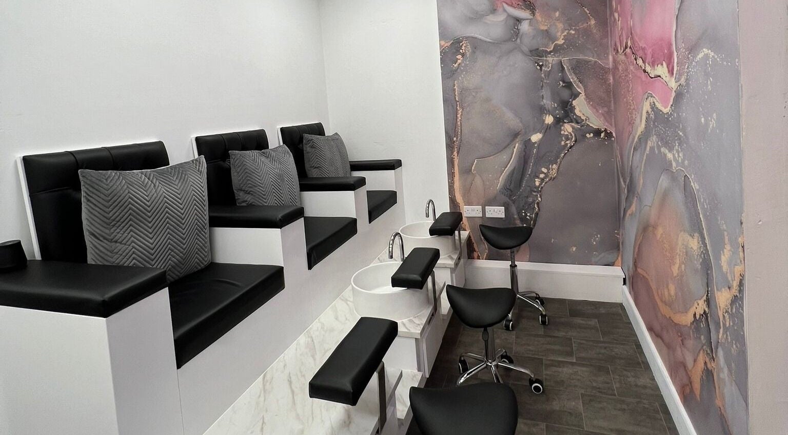 Stylish pedicure station at Salon 15 Beauty Rooms, Dublin, County Dublin, IE with modern seating and decor.
