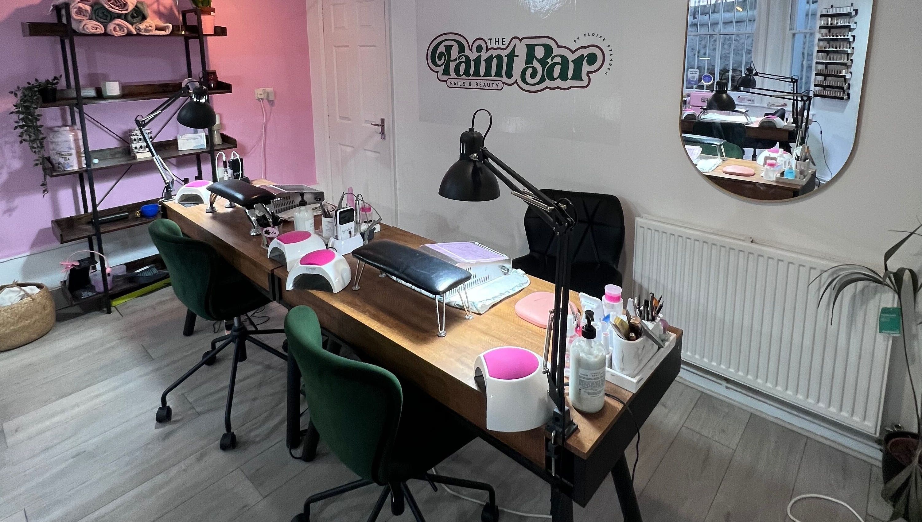 Cozy manicure stations at The Paint Bar, Brighton And Hove, England, GB. Inviting and stylish nail salon setup.