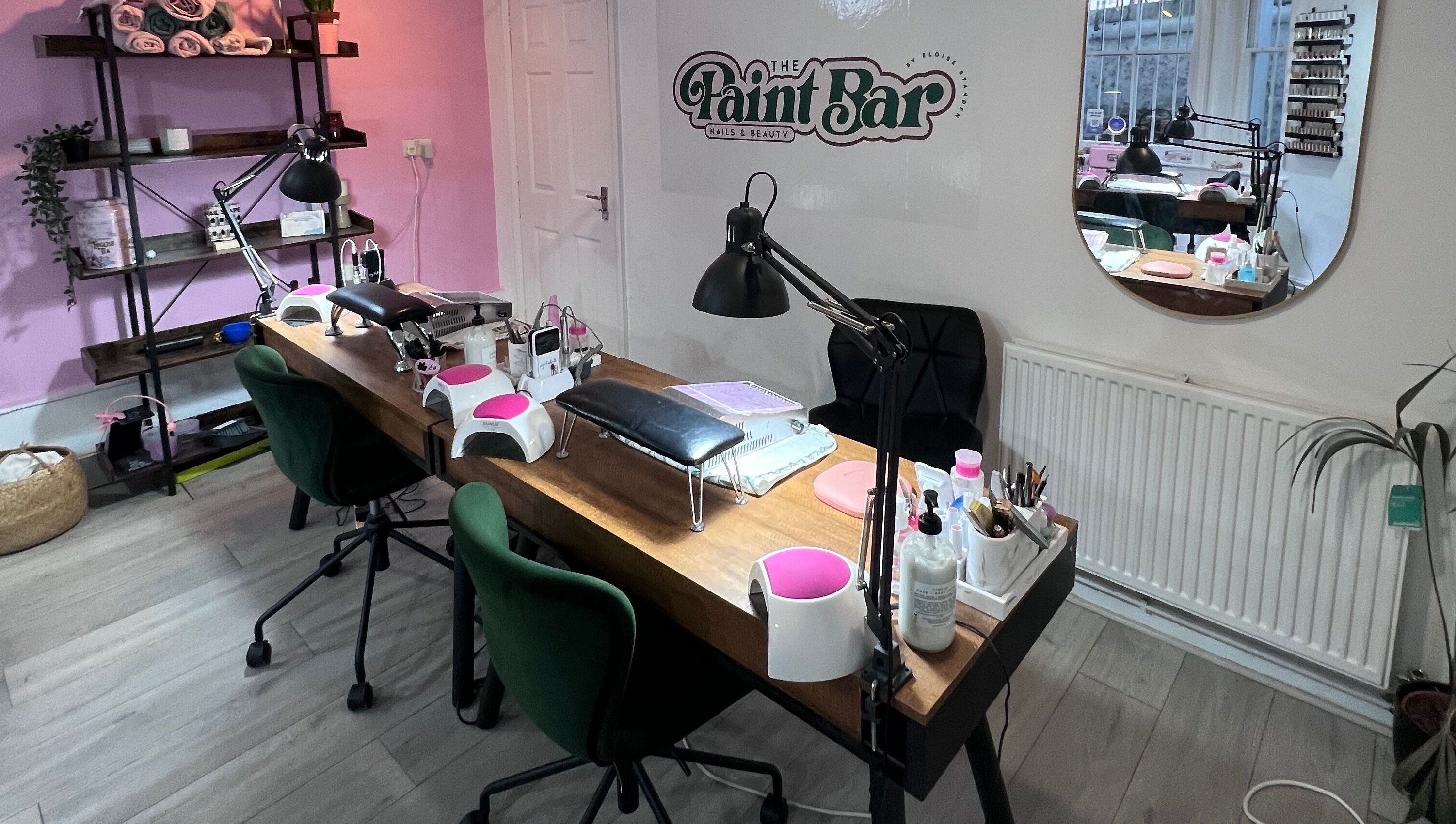 Cozy manicure stations at The Paint Bar, Brighton And Hove, England, GB. Inviting and stylish nail salon setup.