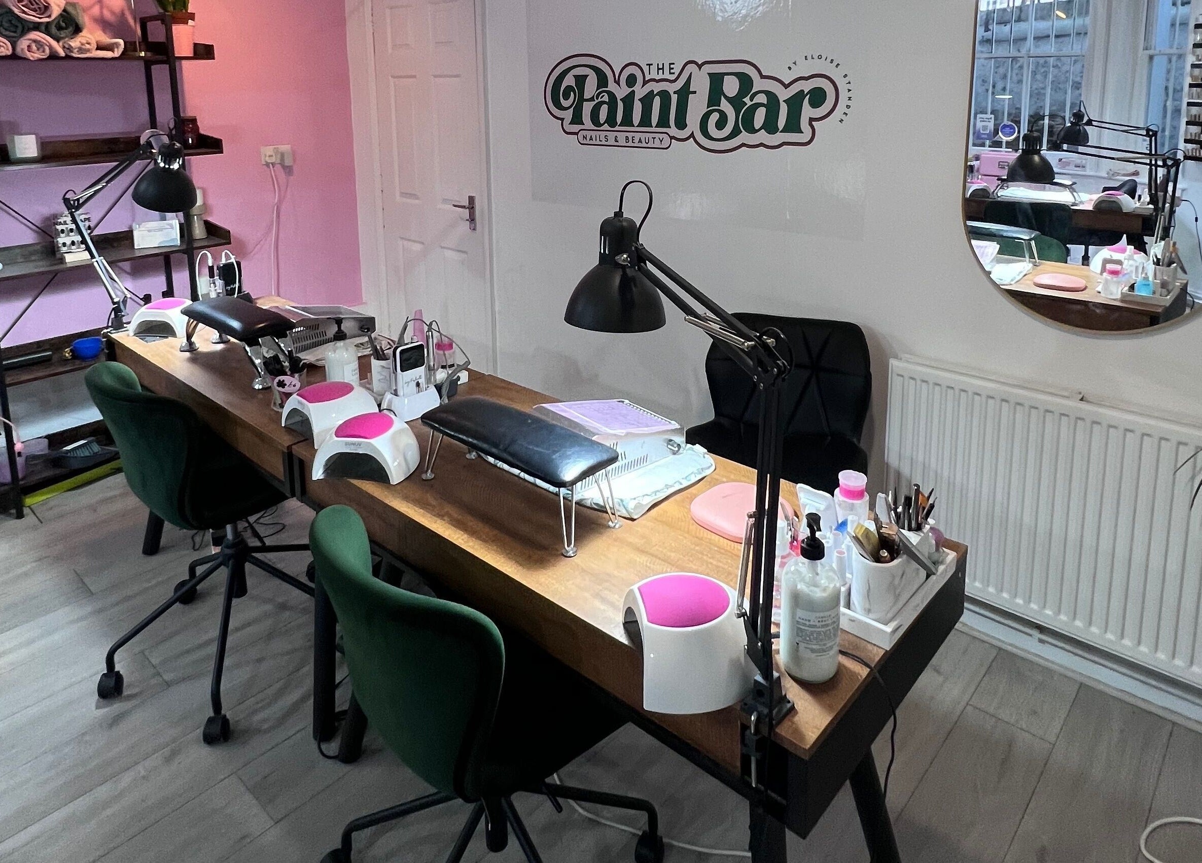 Cozy manicure stations at The Paint Bar, Brighton And Hove, England, GB. Inviting and stylish nail salon setup.