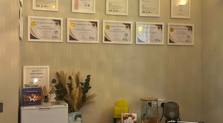 Certificates of excellence displayed at L B Aesthetics and Beauty, Ashford, England, GB highlighting expertise.