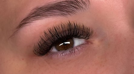 Close-up of expertly applied eyelash extensions at Lashes W Ri in Harrisburg, Illinois, US.