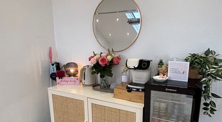 Elegant refreshment setup at By Lilly Studio, Wilmslow, England, GB with flowers and drinks.