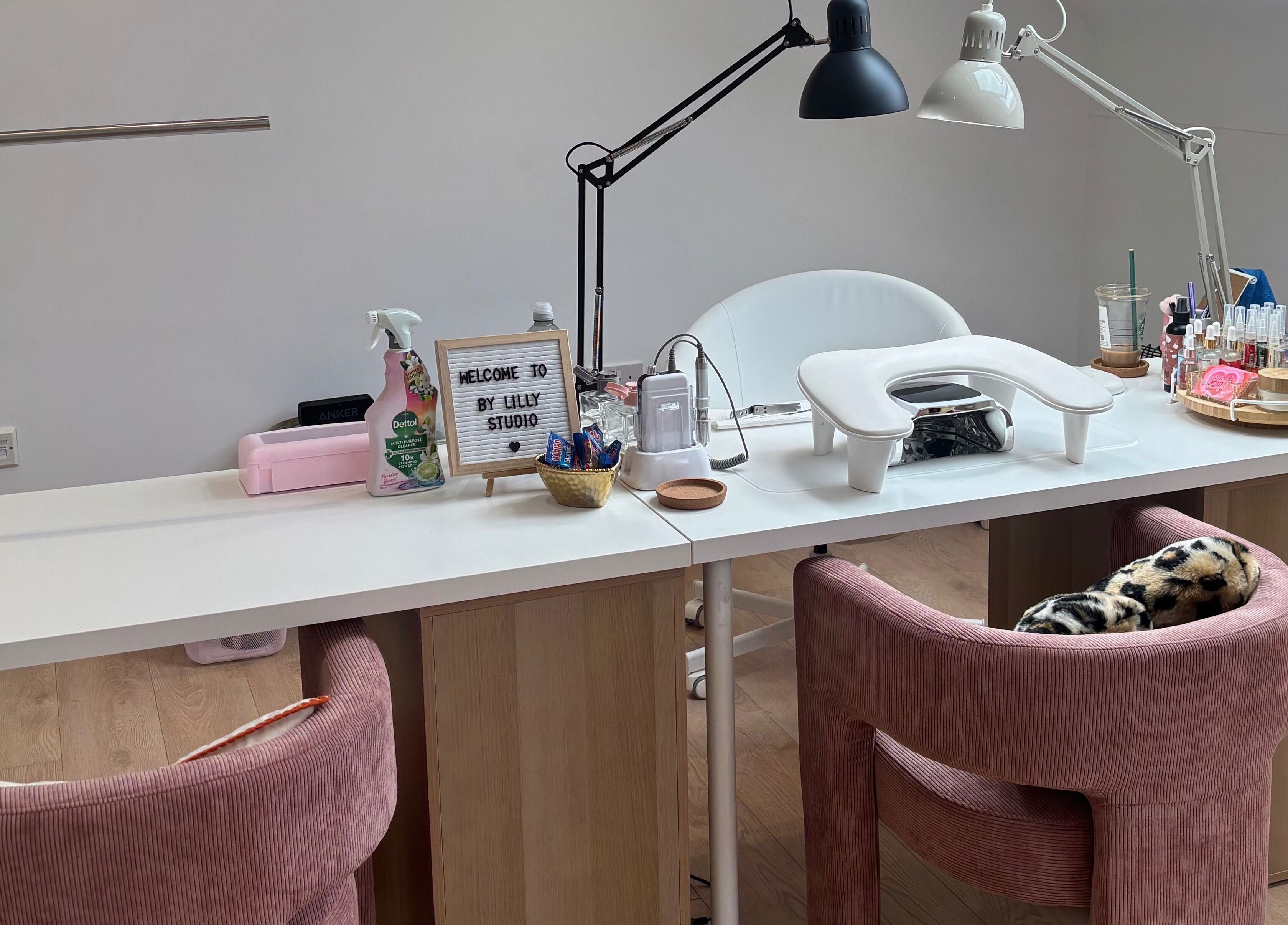 Elegant nail station at By Lilly Studio in Wilmslow, England, GB showcasing a welcoming, stylish setup.
