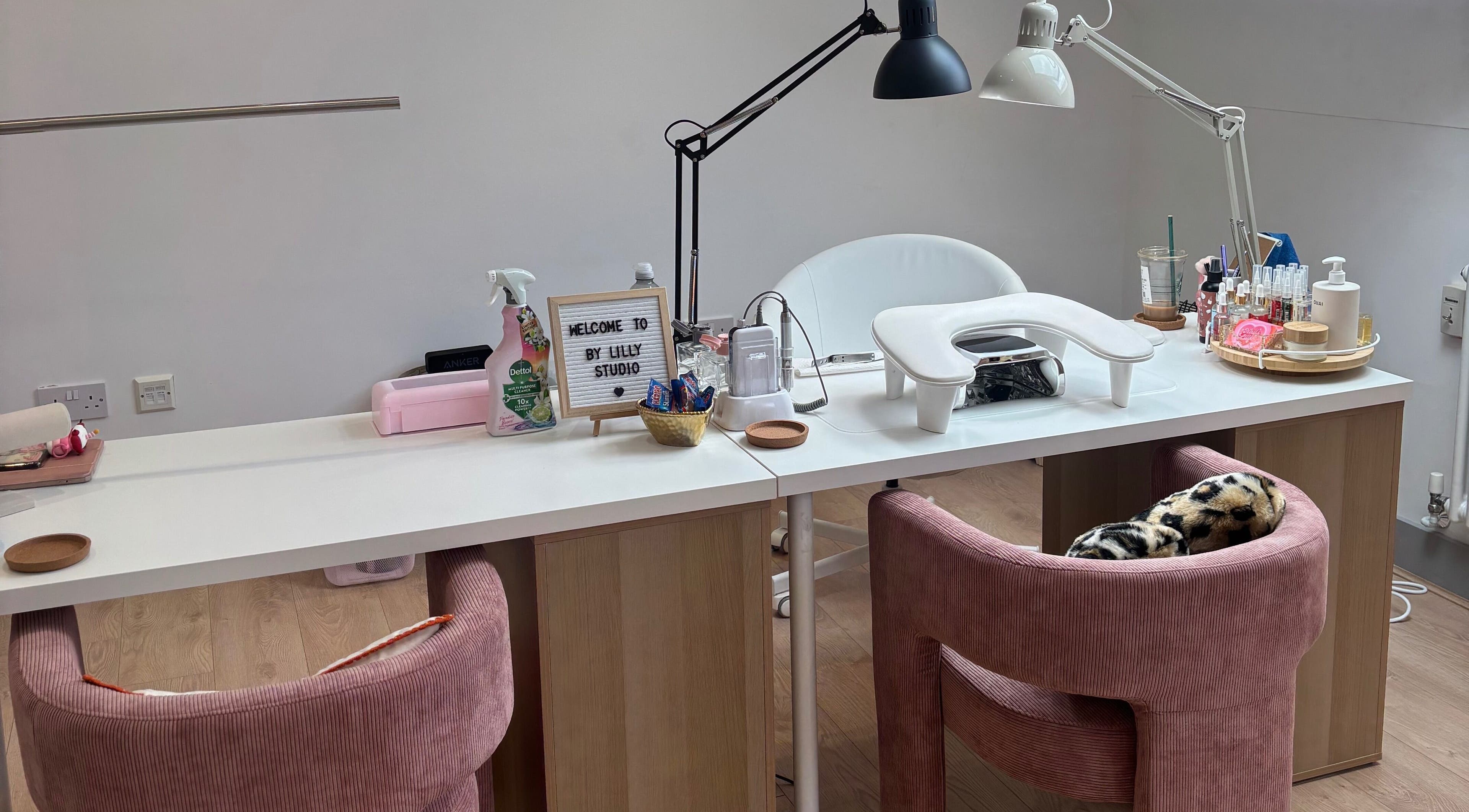 Elegant nail station at By Lilly Studio in Wilmslow, England, GB showcasing a welcoming, stylish setup.