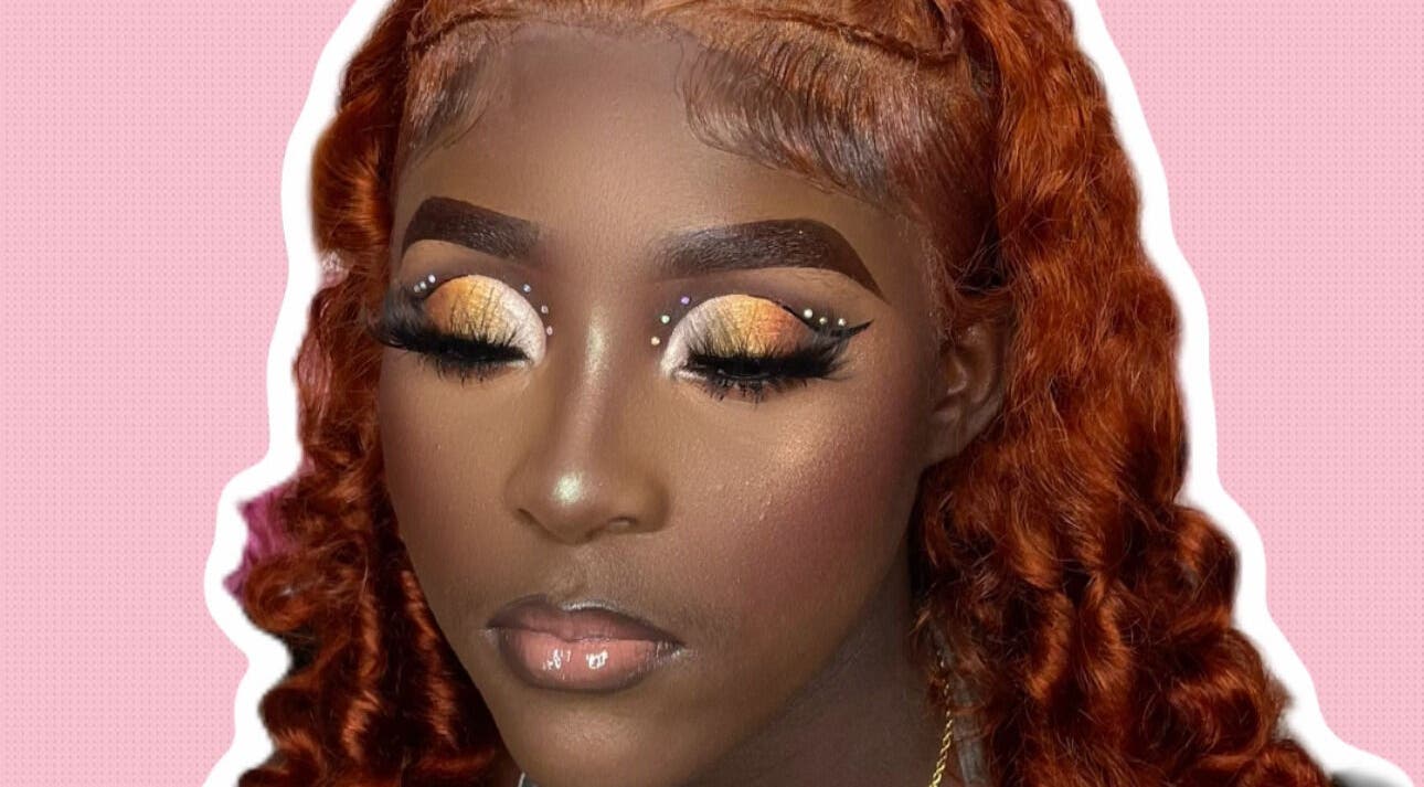 Stunning makeup artistry at Glow by Que Tae, Kingston, St. Andrew Parish, JM with vibrant eyeshadow and curls.