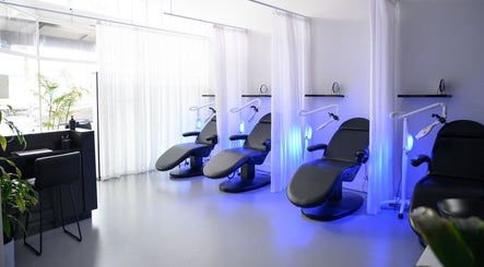 Modern treatment room at The Whitening Co - Whangarei, Whangārei, Northland, NZ featuring sleek dental chairs.