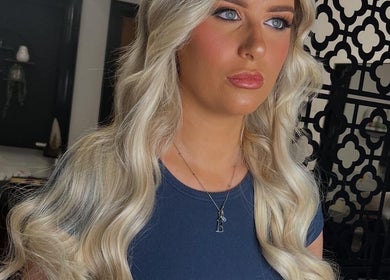 Elegant blonde hairstyle by Hair by Keri Muir in Larbert, Scotland, GB. Perfectly styled waves.