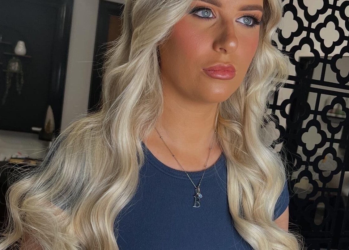 Blonde hairstyle at Hair by Keri Muir in Larbert, Scotland, GB showcasing luxurious curls.