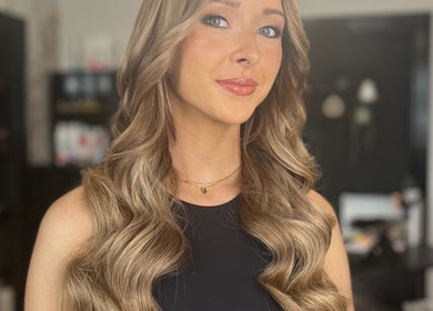 Woman with elegant curls at Hair by Keri Muir, Larbert, Scotland, GB.