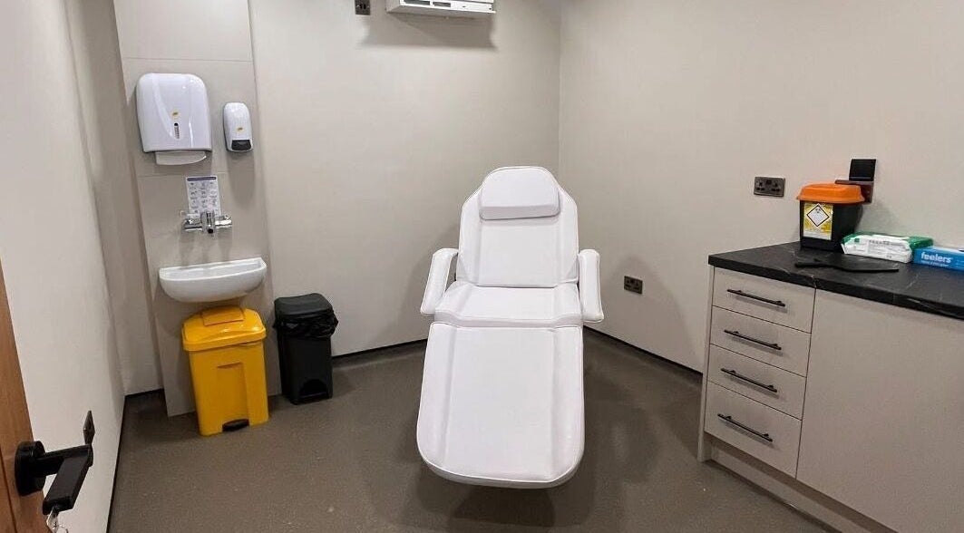 Modern treatment room at Natalie Mcintyre Aesthetics, Bishopbriggs, Scotland, GB. Features a reclining chair.