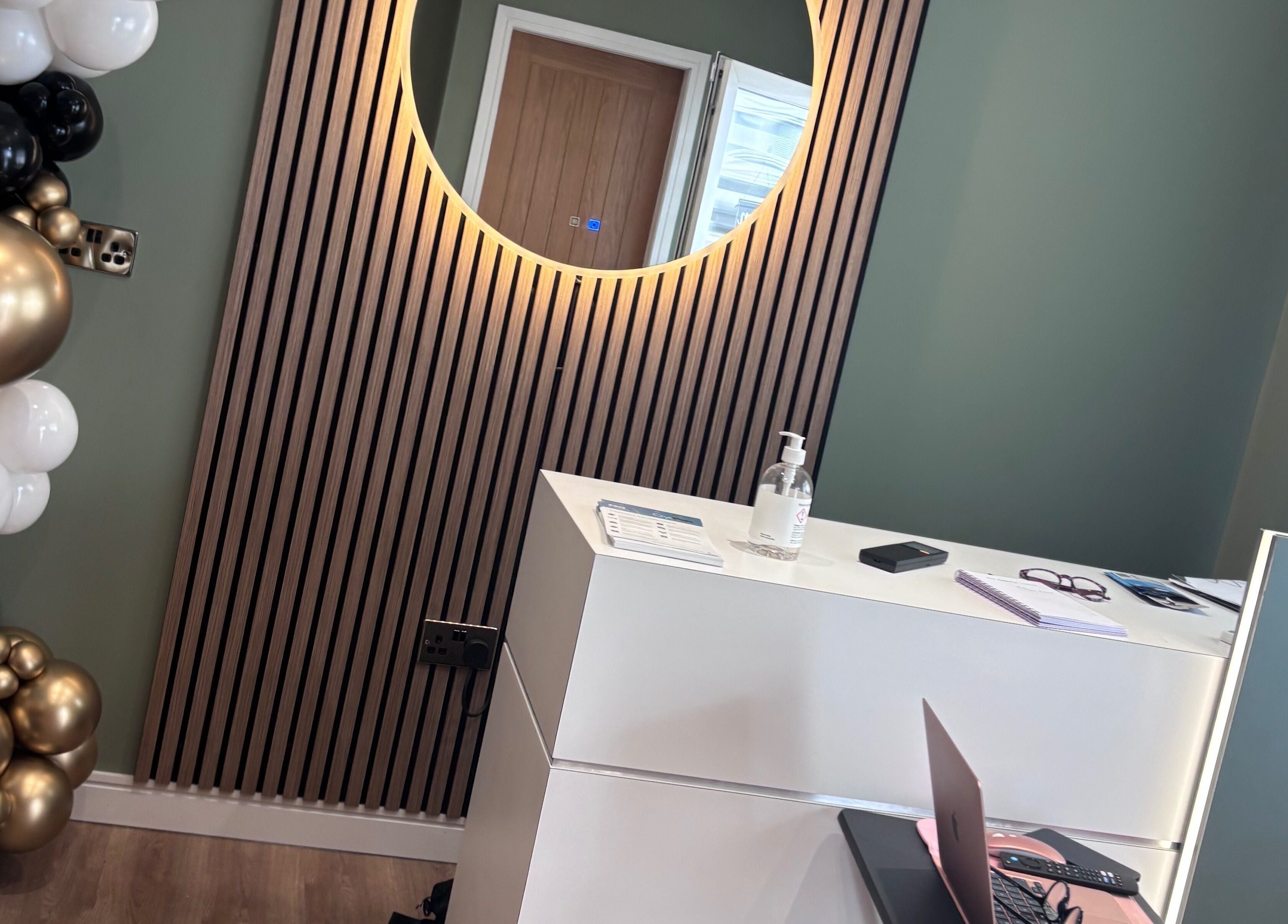 Reception at Natalie Mcintyre Aesthetics, Bishopbriggs, Scotland with modern decor and inviting ambiance.